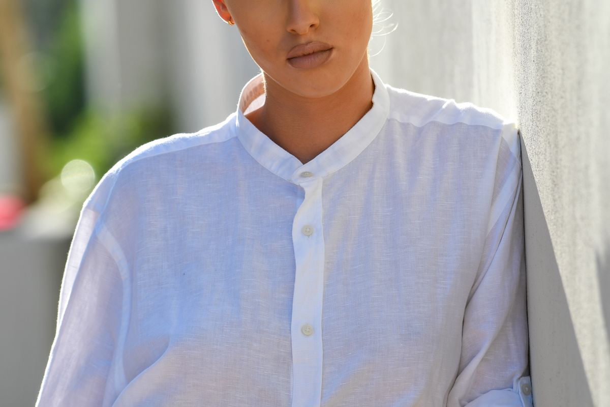 natural linen shirt folded on a table